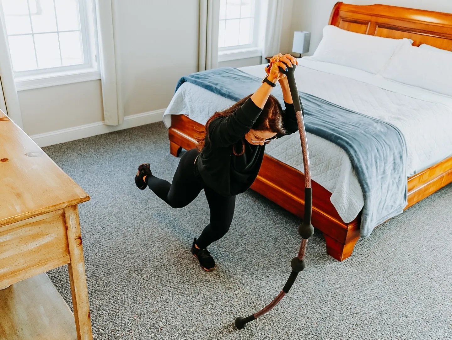 Person stretching at home after a long workday